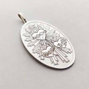 Medalla Sagrados Corazones. Plata 925. 4 cm.